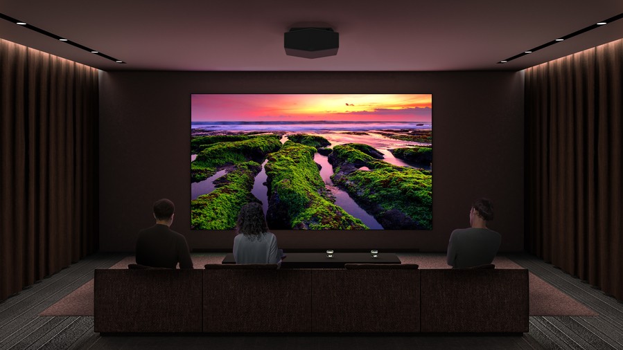 A home theater in Park City with a large projected image of a vibrant sunset landscape showcasing the immersive quality of modern projectors.