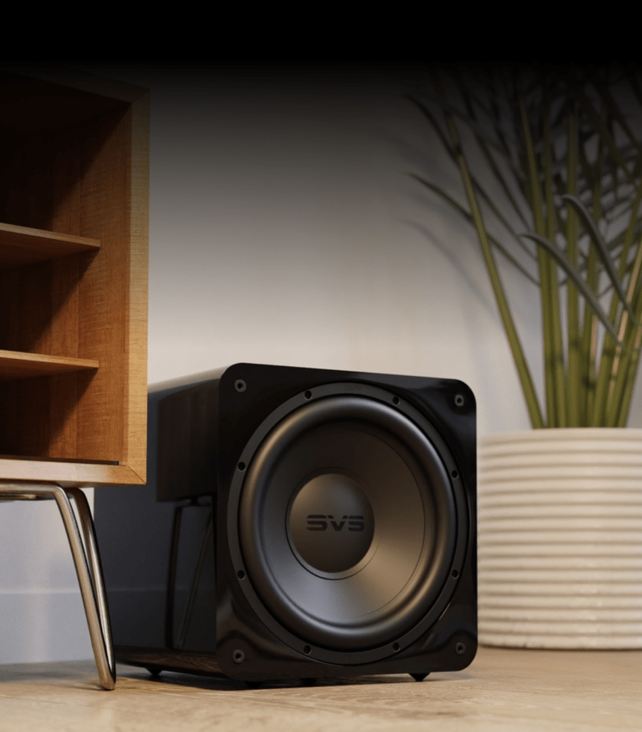 A powerful SVS 17-inch Ultra subwoofer placed in a luxurious home theater setup.